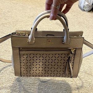 Cream colored Kate Spade purse
